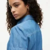 Chambray-paita, jossa on pussihihat Chambray-paita, jossa on pussihihat