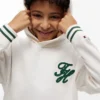 Lasten brodeerattu monogrammihuppari Lasten brodeerattu monogrammihuppari