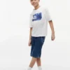 Lasten Tommy Surf -grafiikkat-paita Lasten Tommy Surf -grafiikkat-paita