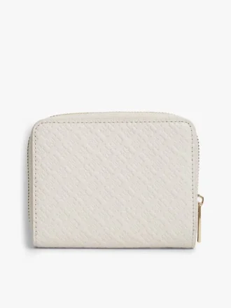 Monogrammilla koristeltu vetoketjullinen lompakko