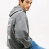 Tommy Jeans -huppari, jossa on spraymaalattu logo Tommy Jeans -huppari, jossa on spraymaalattu logo