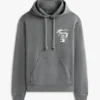 Tommy Jeans -huppari, jossa on spraymaalattu logo Tommy Jeans -huppari, jossa on spraymaalattu logo