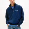 Tommy Jeans -logolla varustettu neljännesvetoketjullinen collegepaita Tommy Jeans -logolla varustettu neljännesvetoketjullinen collegepaita
