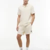 Tommy Jeans -vohvelikuvioiset rantashortsit Tommy Jeans -vohvelikuvioiset rantashortsit