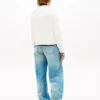 Tommy Jeansin lippulogolla koristeltu neule Tommy Jeansin lippulogolla koristeltu neule