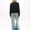 Tommy Jeansin lippulogolla koristeltu neule Tommy Jeansin lippulogolla koristeltu neule