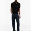 Tommy Jeansin lyhythihainen neulepolo Tommy Jeansin lyhythihainen neulepolo