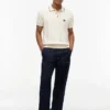 Tommy Jeansin lyhythihainen neulepolo Tommy Jeansin lyhythihainen neulepolo