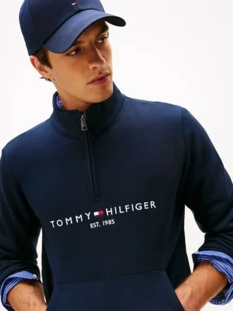 Tommy-logolla varustettu neljännesvetoketjullinen collegepaita
