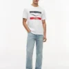 Tommy x Cadillac F1® Team Chevron -T-paita Tommy x Cadillac F1® Team Chevron -T-paita