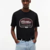 Tommy x Cadillac F1® Team Globe -T-paita Tommy x Cadillac F1® Team Globe -T-paita