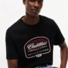 Tommy x Cadillac F1® Team Globe -T-paita Tommy x Cadillac F1® Team Globe -T-paita