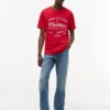 Tommy x Cadillac F1® Team Retro Chevron -T-paita Tommy x Cadillac F1® Team Retro Chevron -T-paita